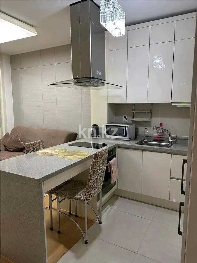 Продажа 1-комнатной квартиры, 42 м², пр. Кошкарбаева, дом  10/1 в Астане - фото 2
