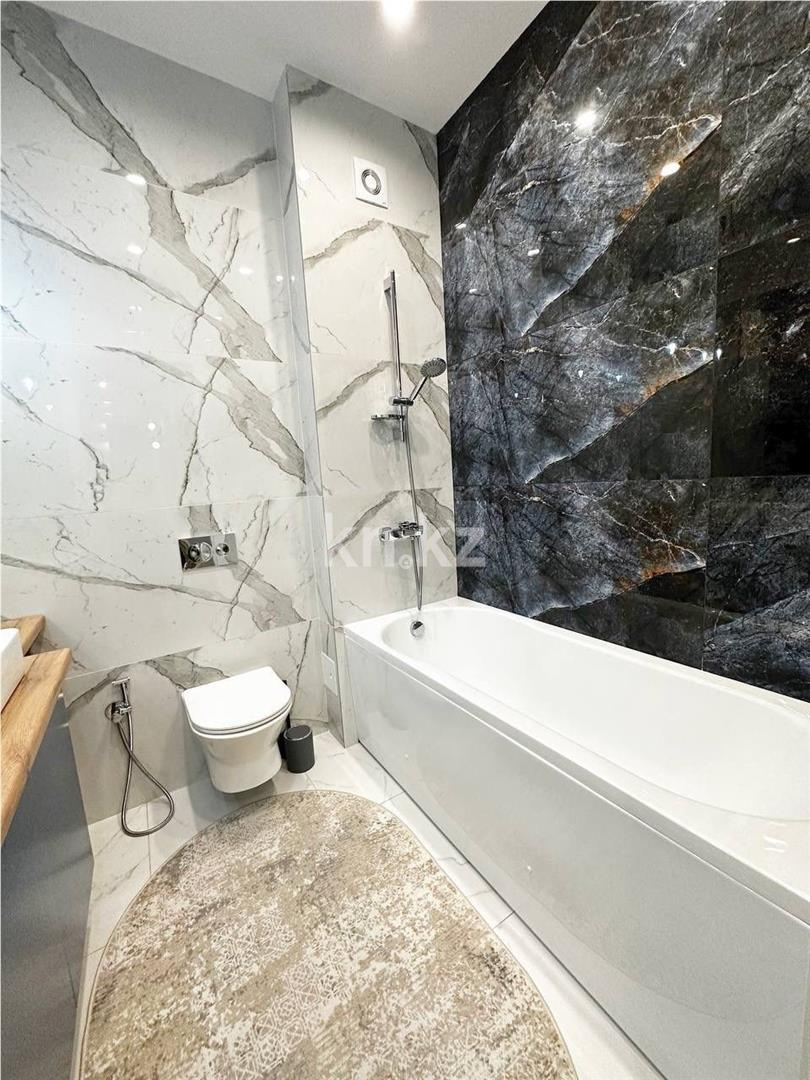 Продажа 2-комнатной квартиры, 67 м², ул. Е-900 в Астане - фото 9