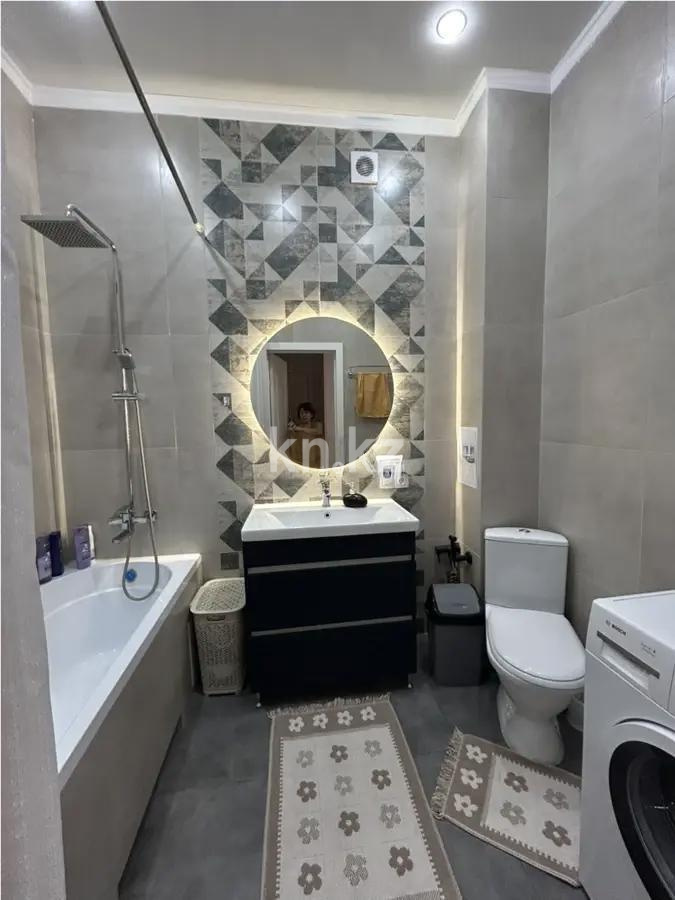 Продажа 2-комнатной квартиры, 52 м², ул. Толе би, дом  12/1 в Астане - фото 4