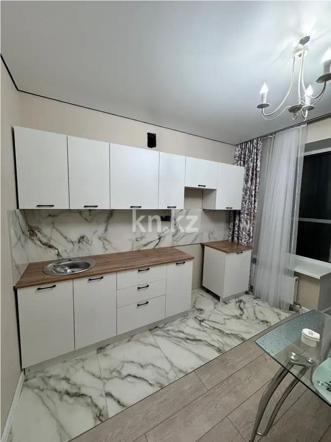 Продажа 1-комнатной квартиры, 38 м², ул. Нажимеденова, дом  52а в Астане - фото 2