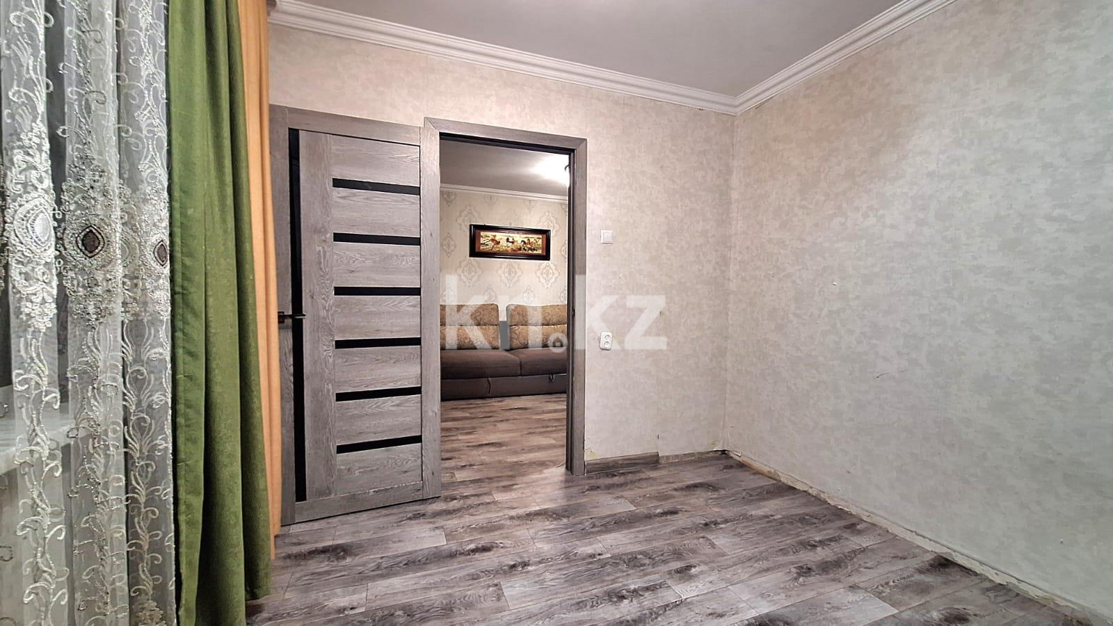 Продажа 4-комнатной квартиры, 61 м², 16 мкр. в Караганде - фото 4