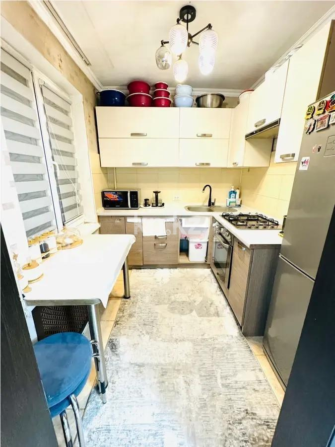 Продажа 3-комнатной квартиры, 65 м², ул. Сатпаева, дом  105 в Алматы - фото 4