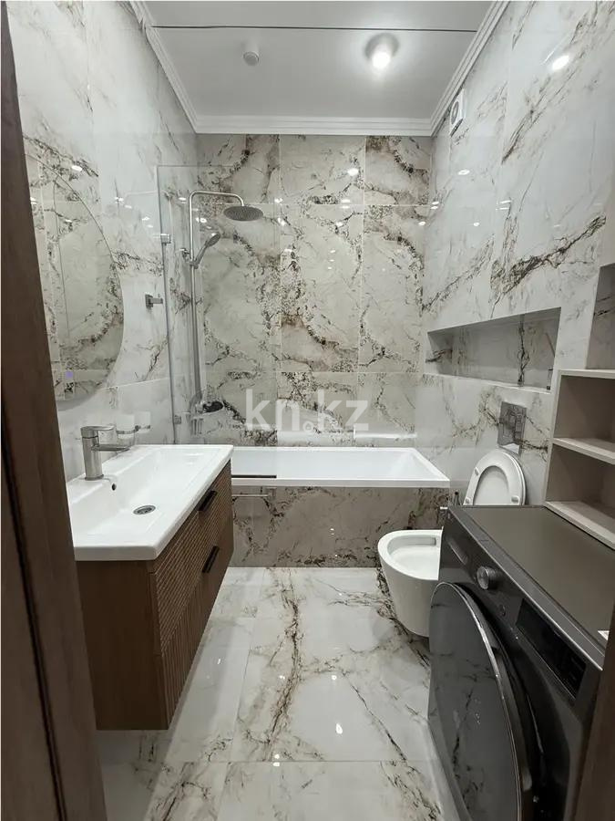 Продажа 2-комнатной квартиры, 49 м², ул. Е-900, дом  6 в Астане - фото 4