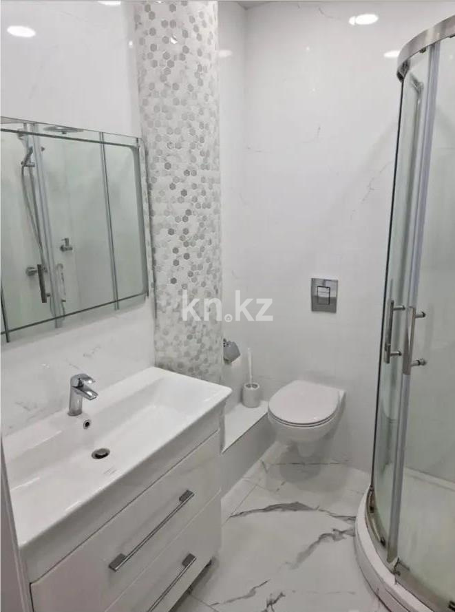 Продажа 4-комнатной квартиры, 117 м², ул. Омарова, дом  27 в Астане - фото 6