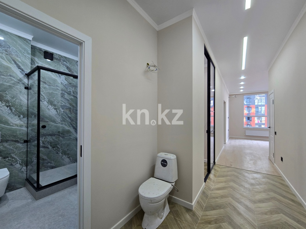 Продажа 2-комнатной квартиры, 55 м², ул. Тургута Озала в Алматы - фото 17