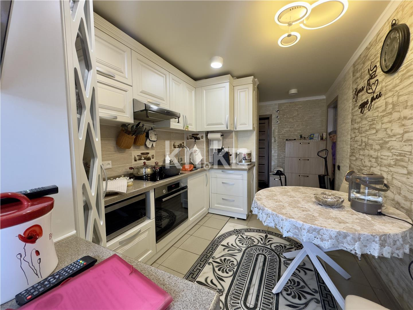 Продажа 2-комнатной квартиры, 49 м², мкр-н Восток-3, дом  16 в Караганде - фото 11