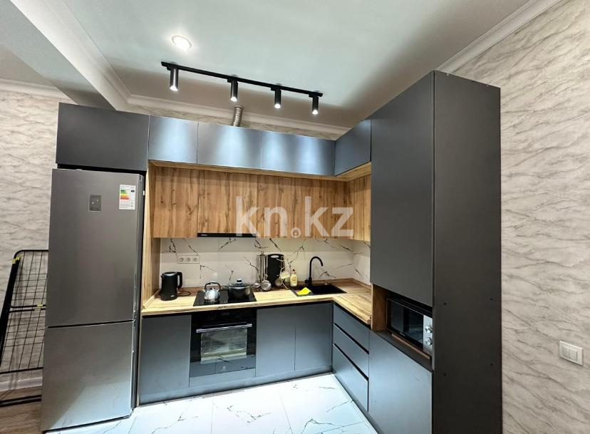 Аренда 1-комнатной квартиры посуточно, 55 м² в Караганде - фото 11