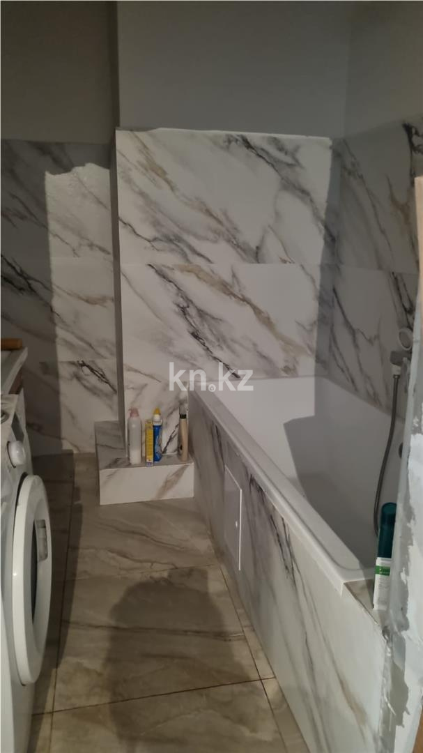 Продажа 1-комнатной квартиры, 47 м², пр. Туран в Астане - фото 4