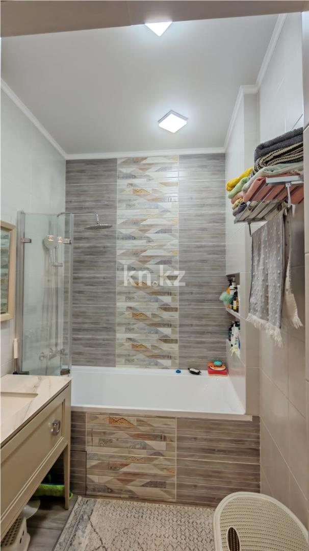 Продажа 4-комнатной квартиры, 123 м², ул. Дюсембекова в Караганде - фото 19