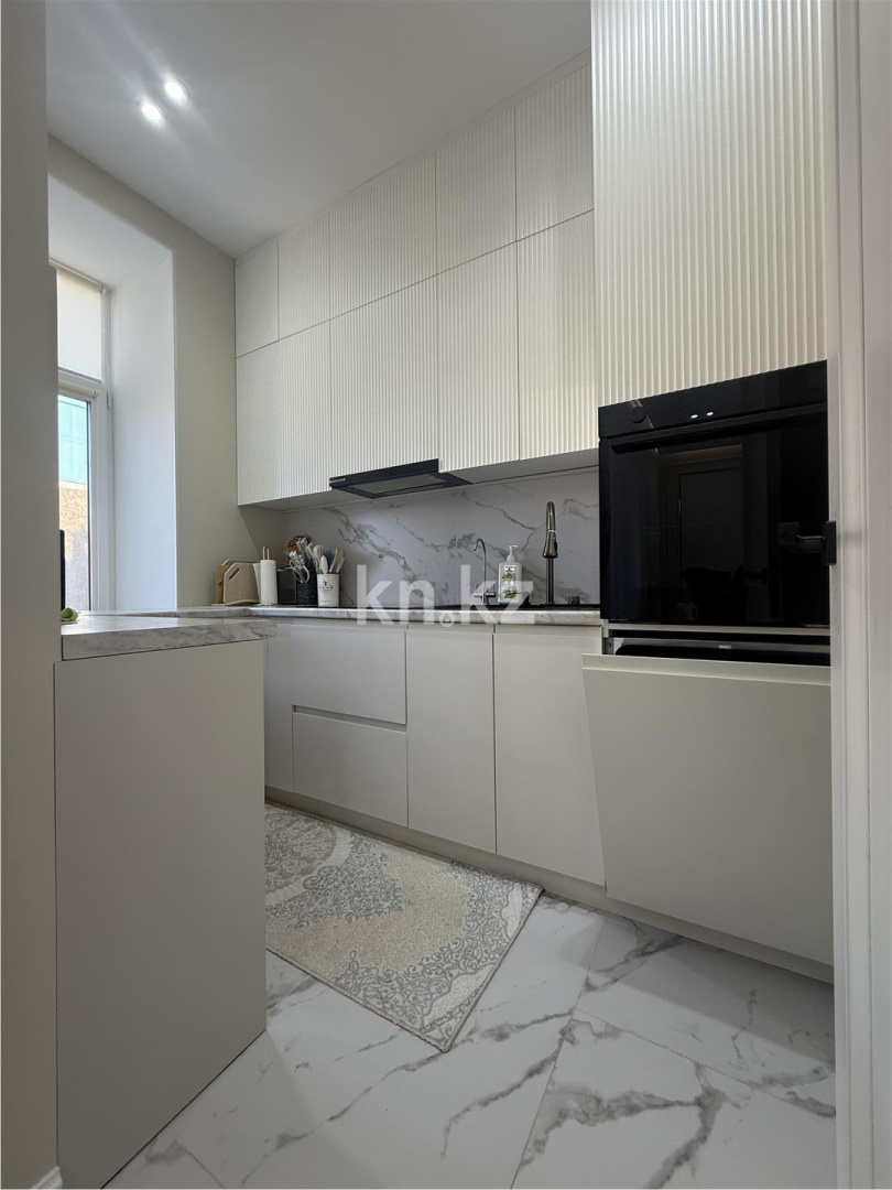 Продажа 4-комнатной квартиры, 120 м², ул. Ашимова, дом  13 в Караганде - фото 23