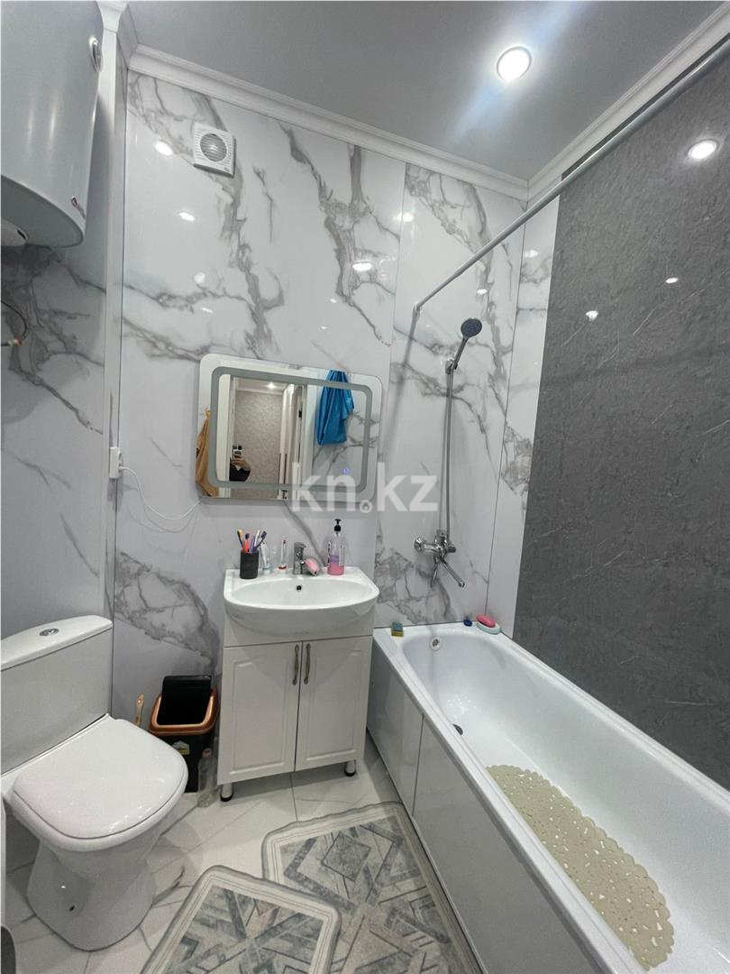 Продажа 2-комнатной квартиры, 61 м², ул. Муканова, дом  78 в Караганде - фото 6