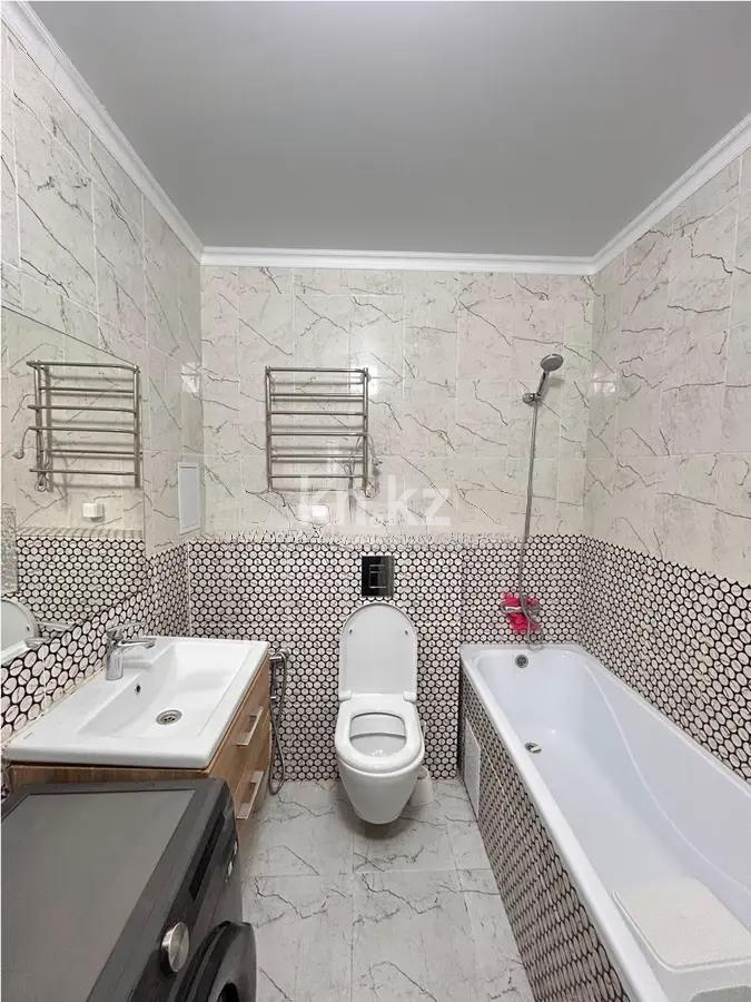 Продажа 2-комнатной квартиры, 61.2 м², пр. Туран, дом  55/11 в Астане - фото 5