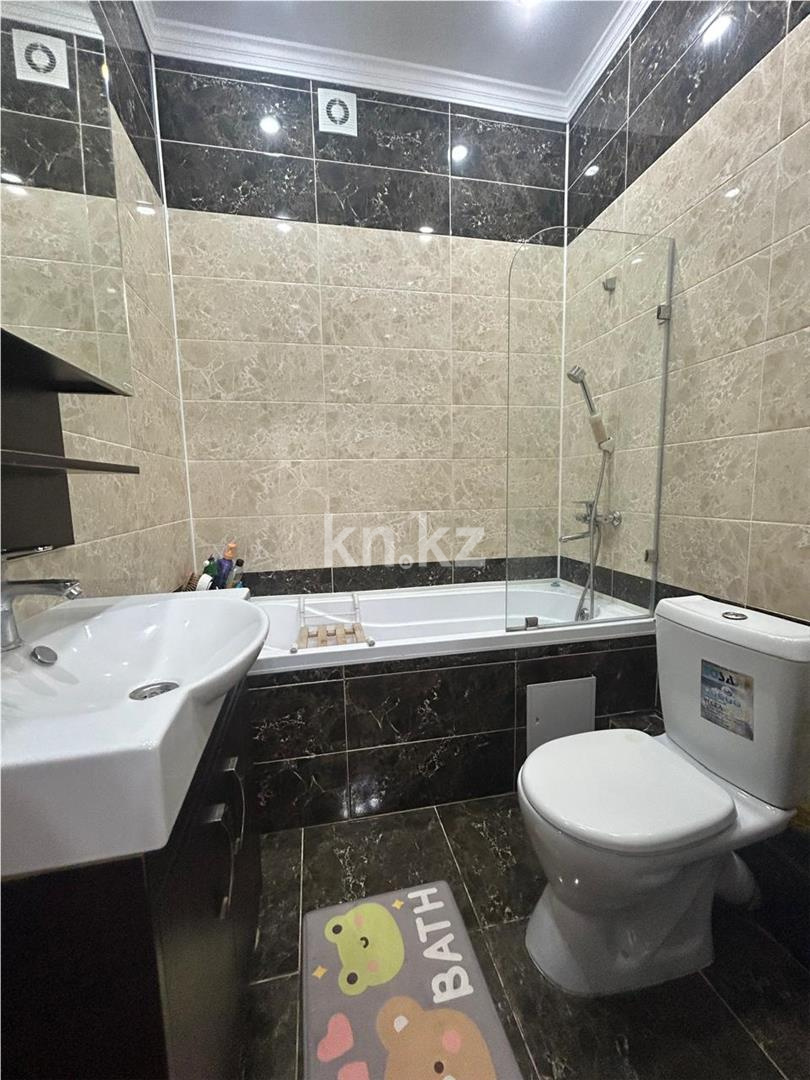 Продажа 2-комнатной квартиры, 65 м², ул. Бокейхана в Астане - фото 15