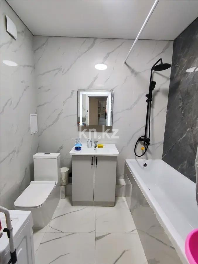 Продажа 2-комнатной квартиры, 50 м², ул. Толе би, дом  285/8 стр в Алматы - фото 4