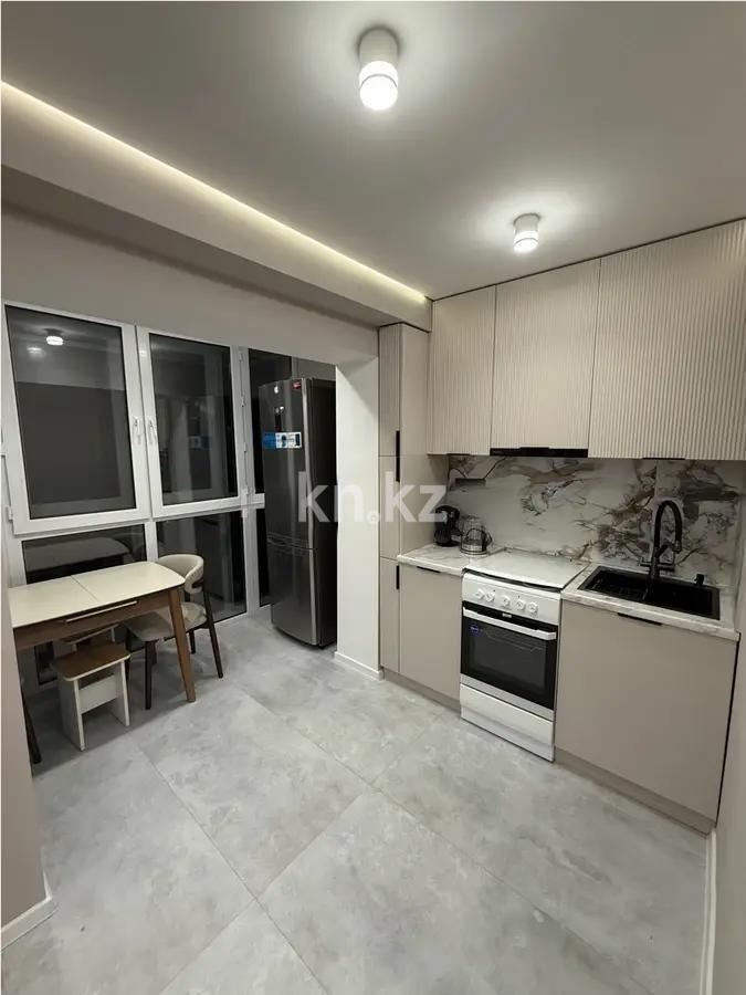 Продажа 2-комнатной квартиры, 52 м², ул. Момышулы, дом  26/2 в Караганде - фото 3