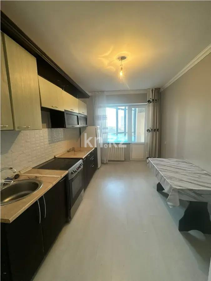 Продажа 1-комнатной квартиры, 42 м², ул. Толе би, дом  40 в Астане - фото 2