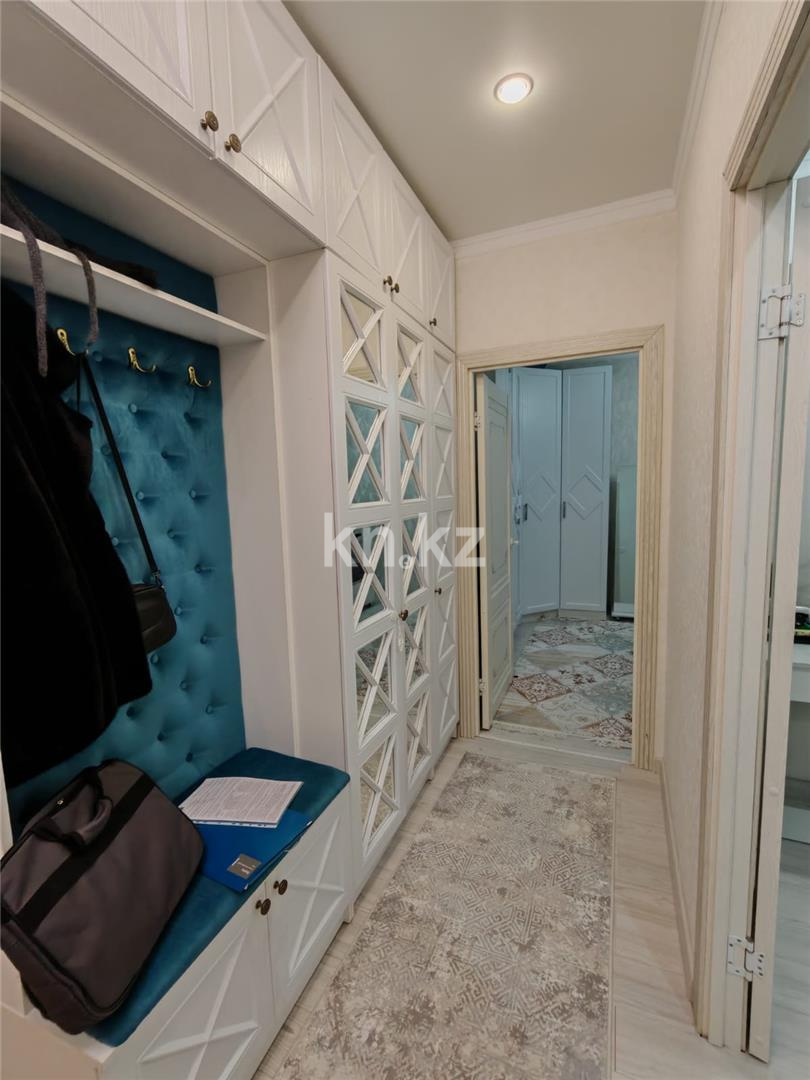 Продажа 2-комнатной квартиры, 62 м², ул. Сарыарка в Караганде - фото 4