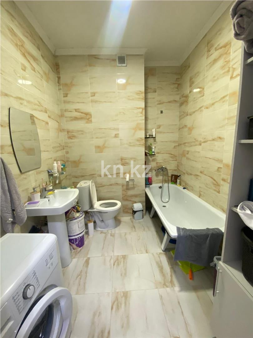 Продажа 2-комнатной квартиры, 64 м², ул. Туркестан в Астане - фото 7