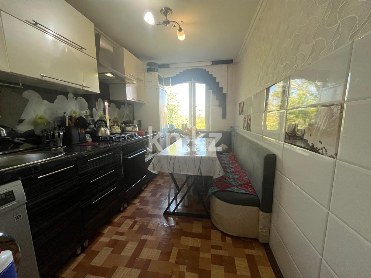 Продажа 4-комнатной квартиры, 63 м², пр. Строителей, дом  17 в Караганде - фото 7