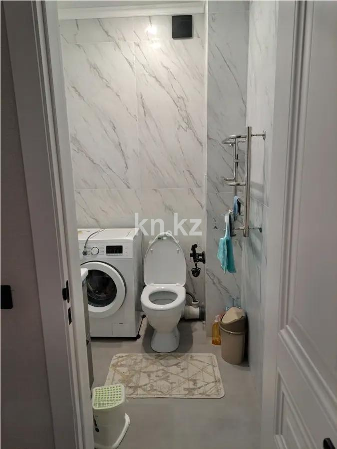 Продажа 2-комнатной квартиры, 56.3 м², пр. Тлендиева, дом  50/2 в Астане - фото 4