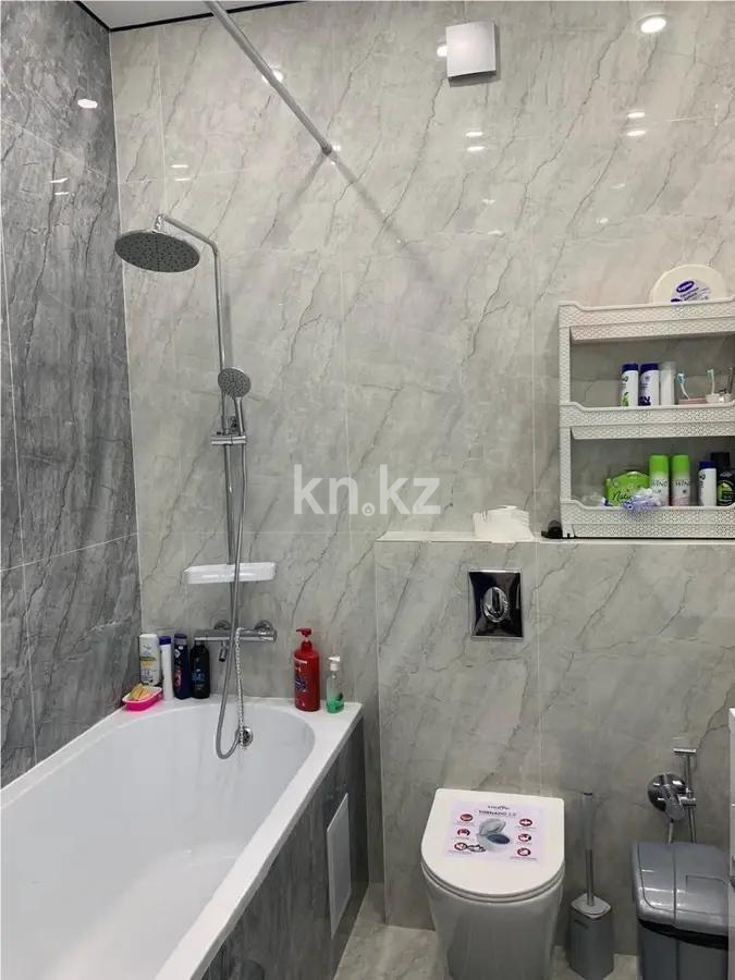 Продажа 2-комнатной квартиры, 65 м², ул. Калдаякова, дом  25а в Астане - фото 4