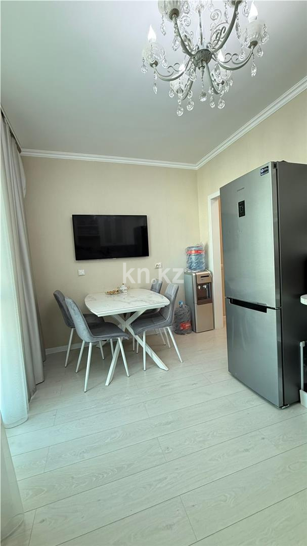 Продажа 1-комнатной квартиры, 49 м², ул. Сыганак в Астане - фото 2