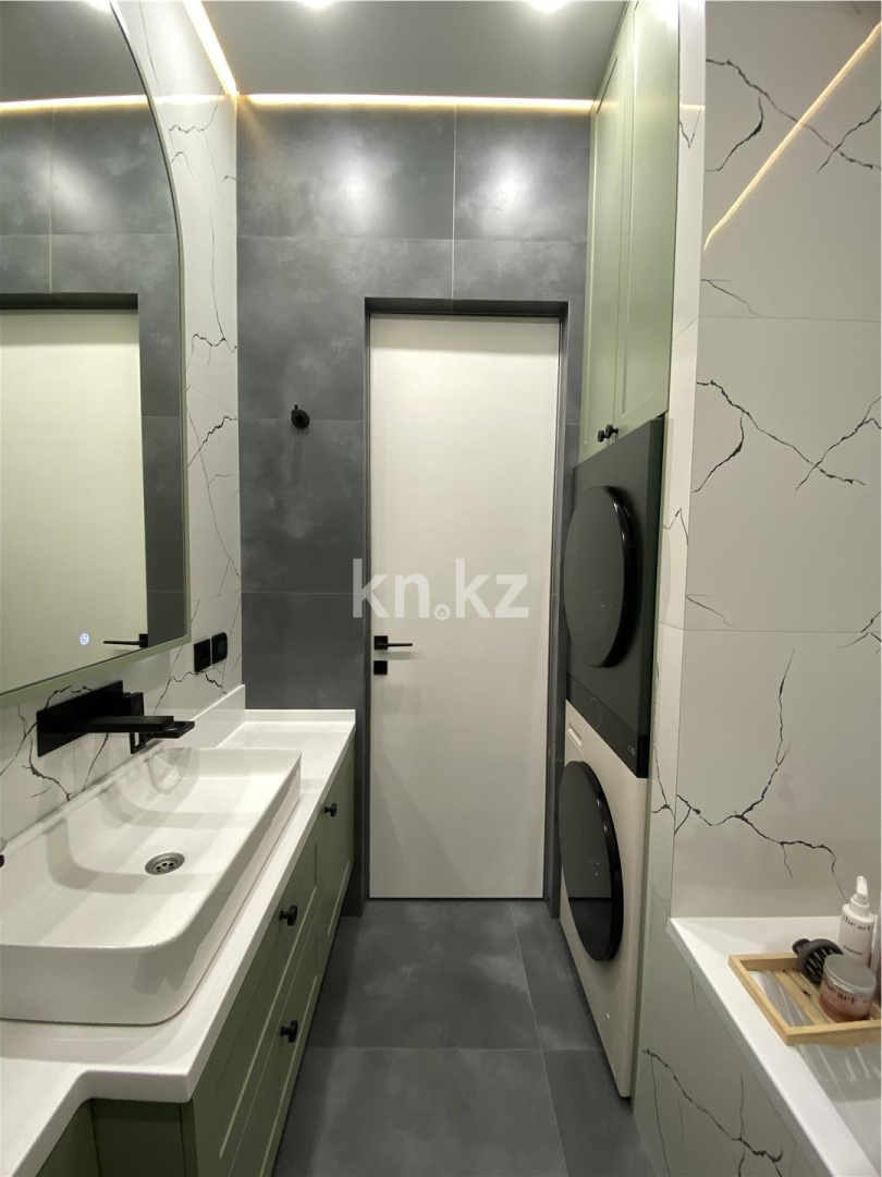 Продажа 2-комнатной квартиры, 52 м², пр. Тауелсыздык в Астане - фото 12