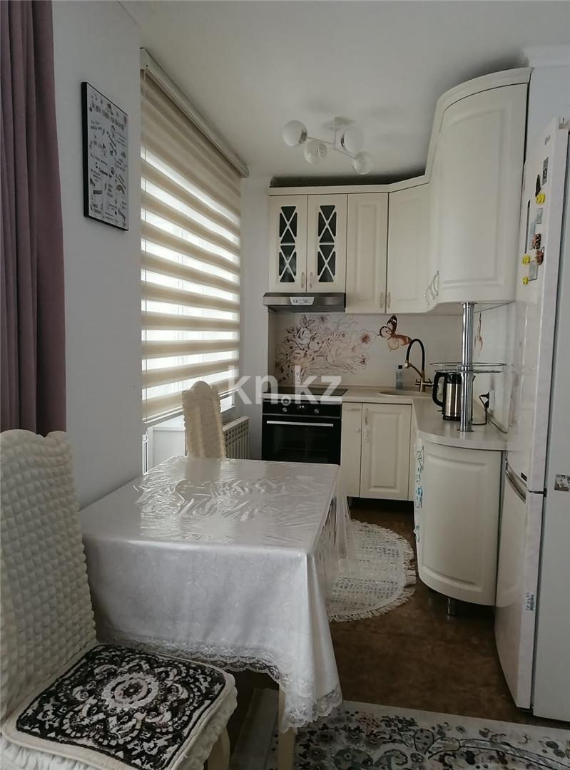 Продажа 2-комнатной квартиры, 54 м², ул. Ашимова, дом  28 в Караганде - фото 7