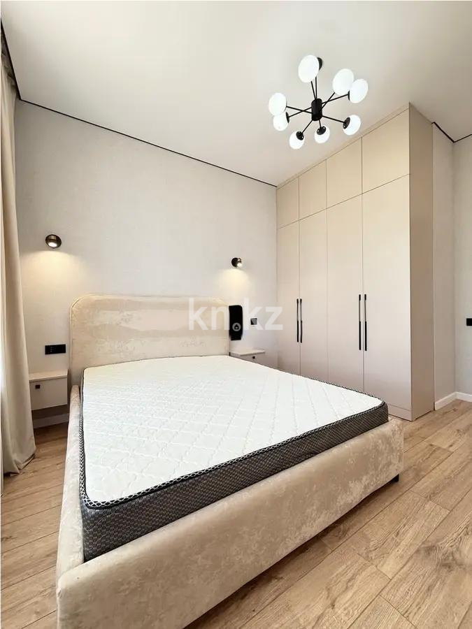 Продажа 2-комнатной квартиры, 52 м², ул. Казыбек би, дом  7/1 в Астане - фото 2