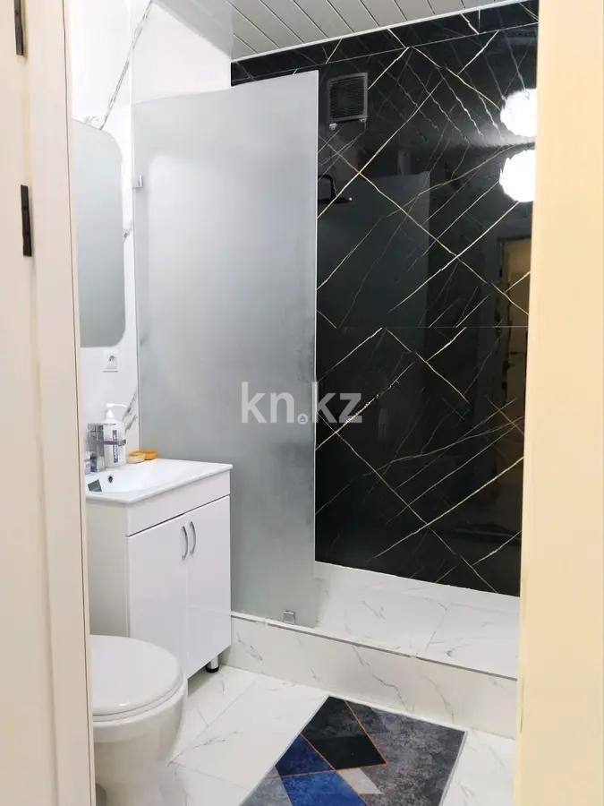 Продажа 2-комнатной квартиры, 52 м², ул. Е-181, дом  3 в Астане - фото 4