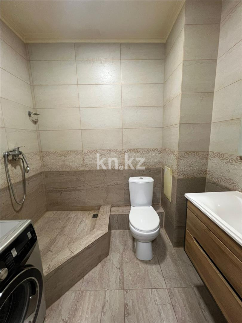 Продажа 2-комнатной квартиры, 57 м², ул. Сыганак в Астане - фото 7