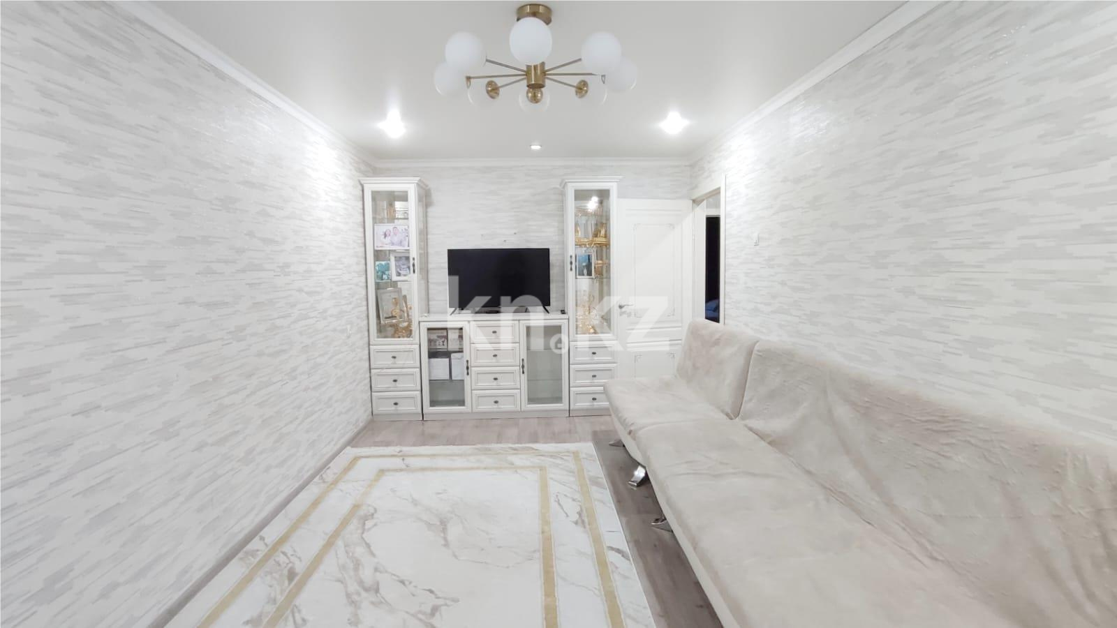 Продажа 3-комнатной квартиры, 63 м², мкр-н 14, дом  42 в Караганде - фото 2