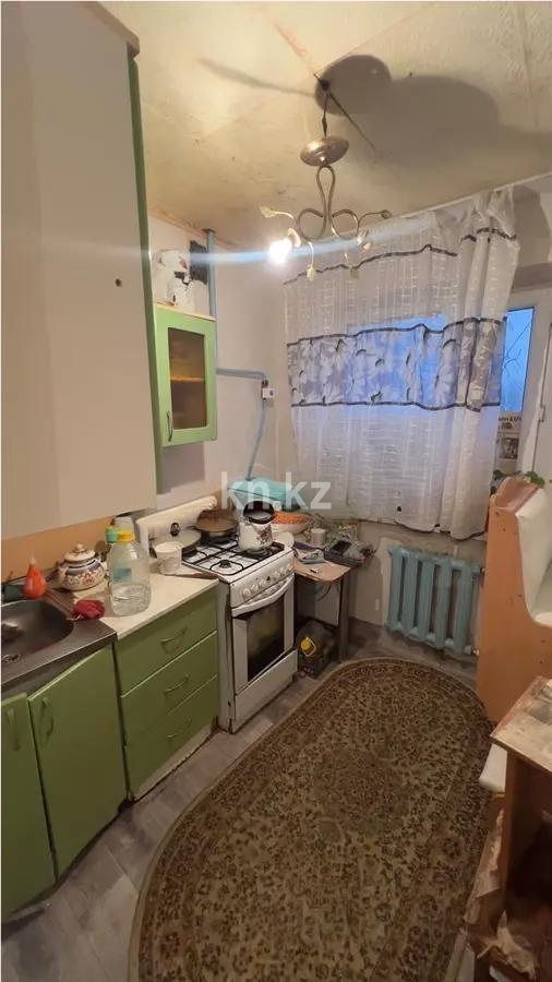 Продажа 1-комнатной квартиры, 32 м², 19 мкр., дом  73 в Караганде - фото 2