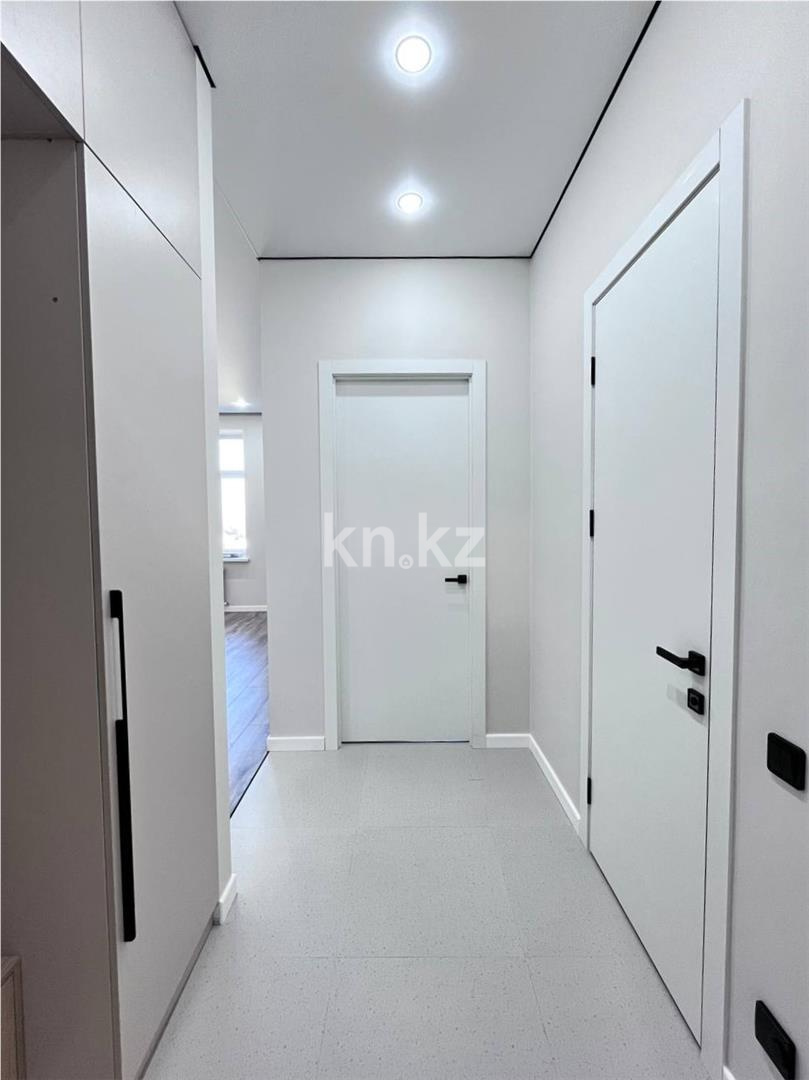 Продажа 2-комнатной квартиры, 52 м², ул. Муканова в Караганде - фото 2