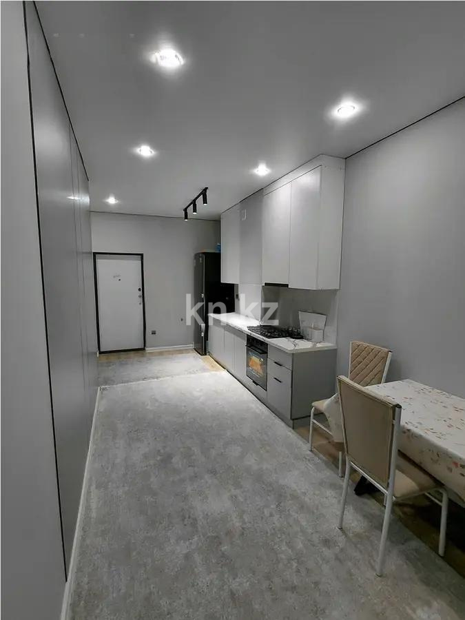 Продажа 1-комнатной квартиры, 40 м², мкр. Нуркент, дом  6/2 в Алматы - фото 2