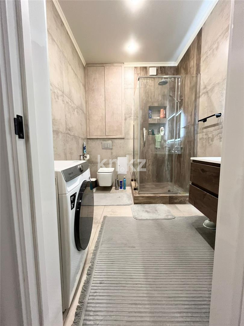 Продажа 2-комнатной квартиры, 66 м², ул. Ашимова в Караганде - фото 9