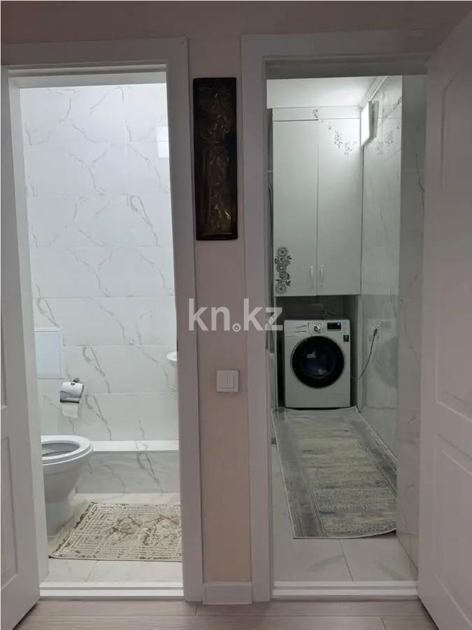 Продажа 2-комнатной квартиры, 66 м², ул. Сыганак в Астане - фото 5