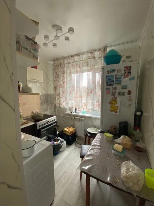 Продажа 3-комнатной квартиры, 58 м², 12 мкр., дом  36 в Караганде - фото 4