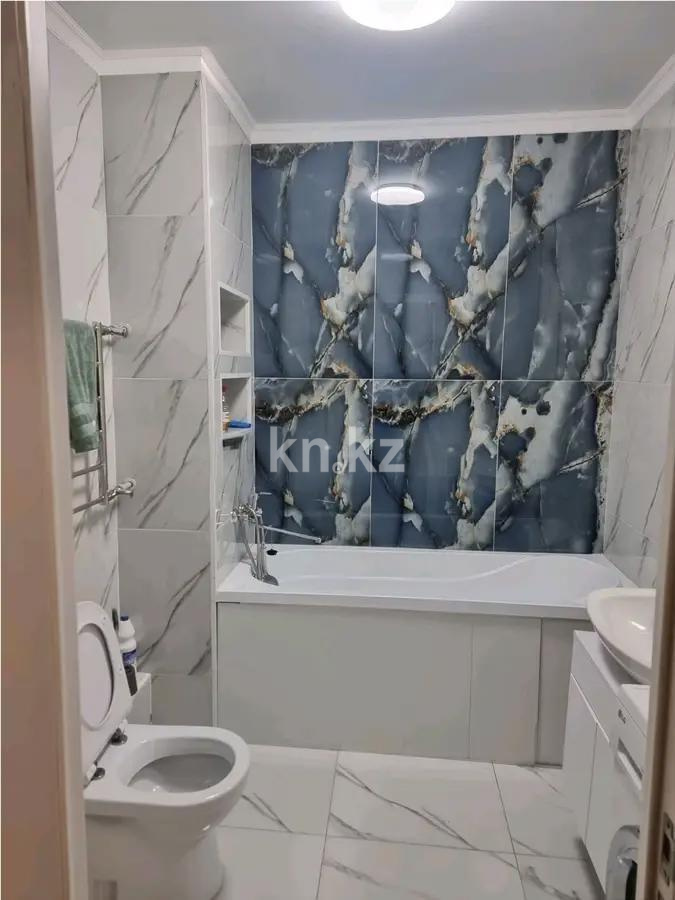 Продажа 2-комнатной квартиры, 62 м², ул. Толе би, дом  285/8 в Алматы - фото 4