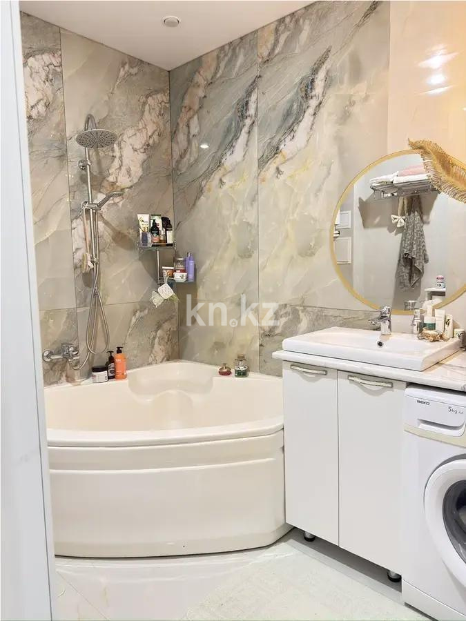 Продажа 2-комнатной квартиры, 62 м², ул. Муканова, дом  86 в Караганде - фото 4