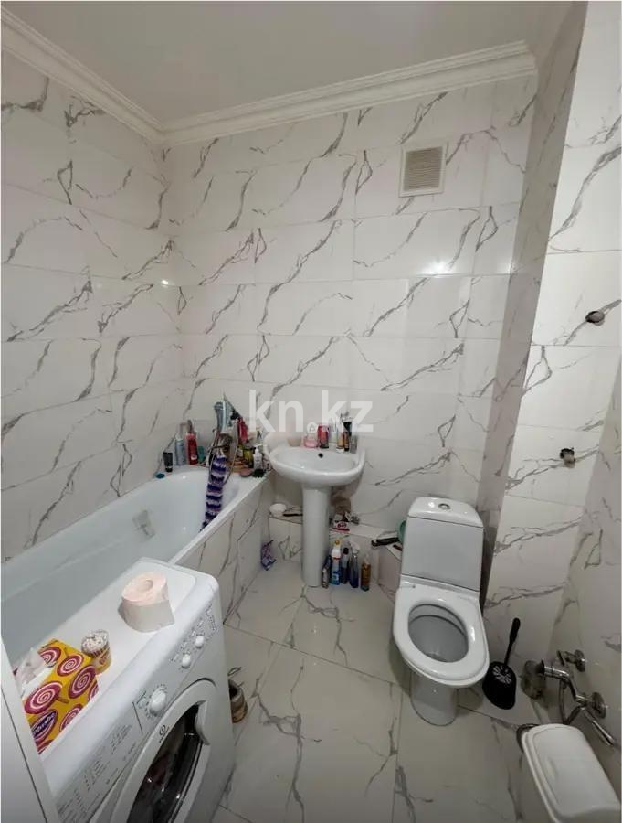 Продажа 2-комнатной квартиры, 52 м², ул. Е-181, дом  3 в Астане - фото 4