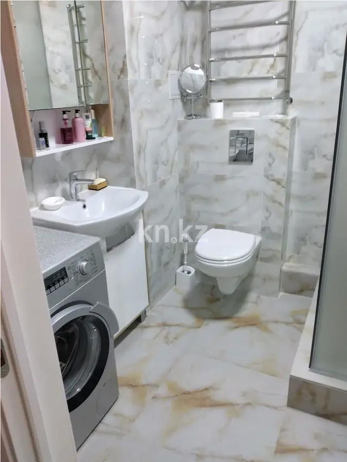 Продажа 1-комнатной квартиры, 47 м², мкр-н Думан-2, дом  28 в Алматы - фото 2