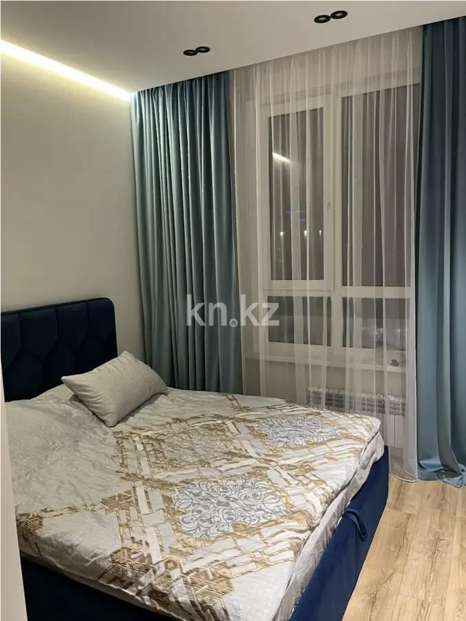 Продажа 2-комнатной квартиры, 59 м², ул. Омарова, дом  2/1 в Астане - фото 2