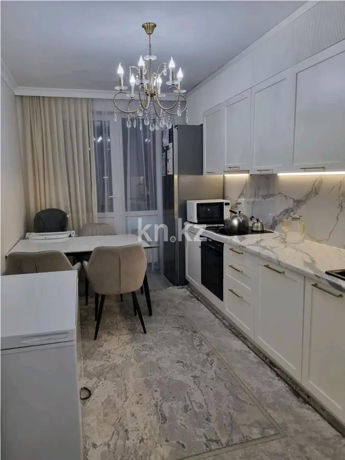Продажа 1-комнатной квартиры, 41 м², мкр-н Нуркент, дом  5/9 в Алматы - фото 2