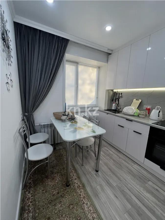 Продажа 2-комнатной квартиры, 50 м², мкр-н 21, дом  1 в Караганде - фото 2