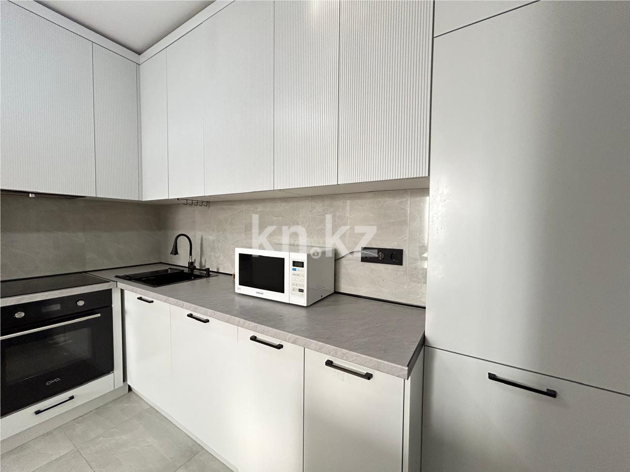 Продажа 2-комнатной квартиры, 77 м², ул. Кенесары в Астане - фото 2