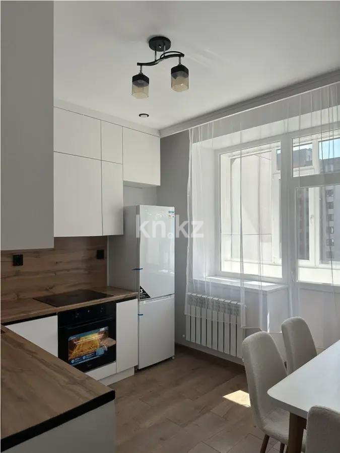 Продажа 1-комнатной квартиры, 36.8 м², ул. Байтурсынова, дом  18 в Астане - фото 2