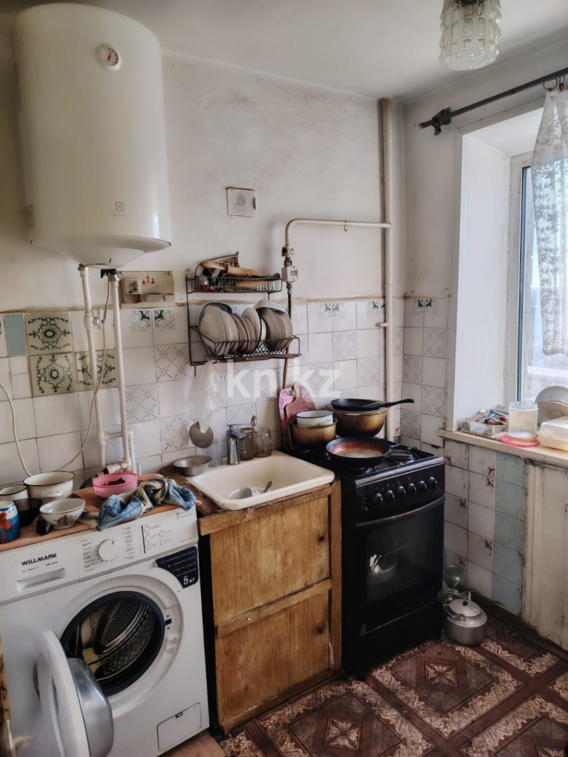 Продажа 4-комнатной квартиры, 61 м², мкр-н 21 в Караганде - фото 11