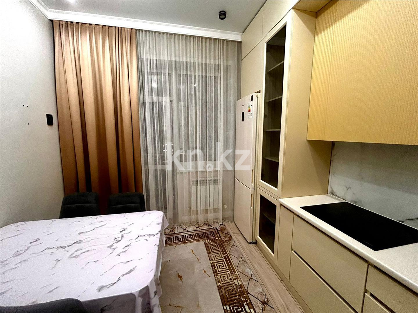 Продажа 2-комнатной квартиры, 63 м², ул. Муканова в Караганде - фото 2