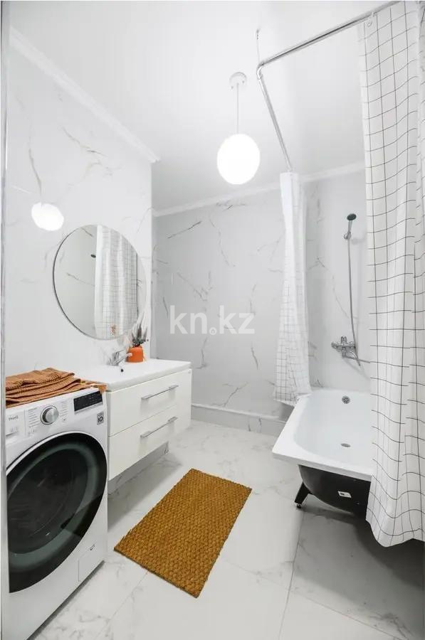 Продажа 2-комнатной квартиры, 63 м², ул. Толе би, дом  181 в Алматы - фото 4